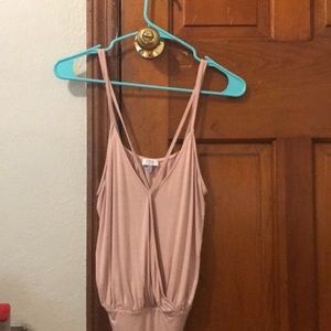 Blush colored body suit